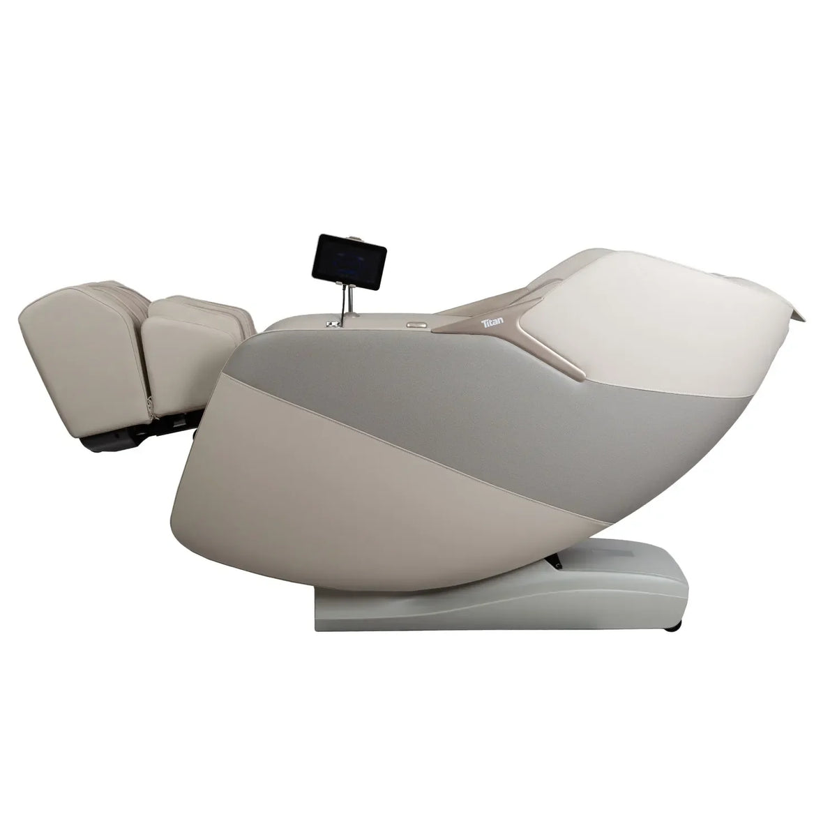 Taupe Titan Pro 4D Astro reclined in the zero gravity position with legs elevated