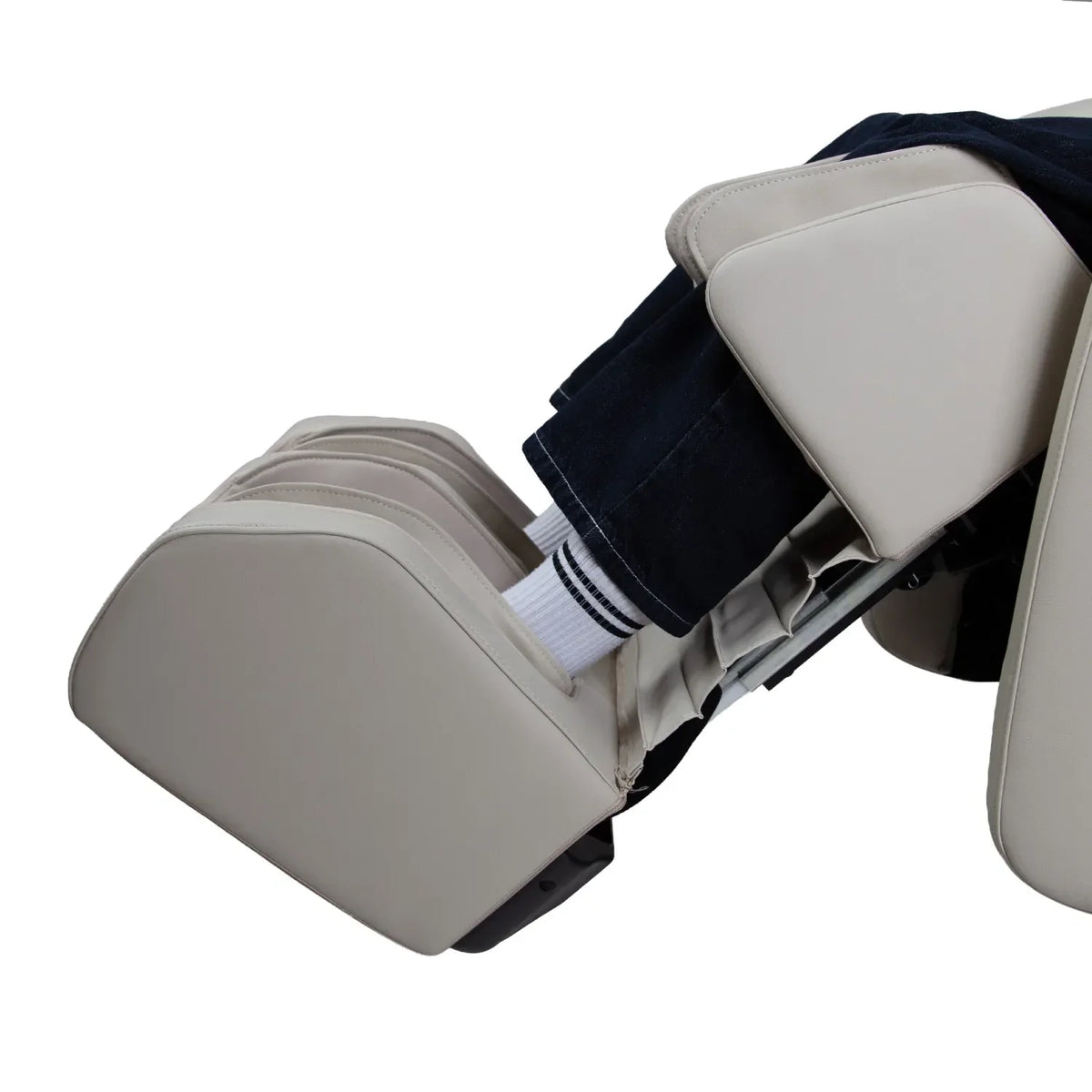 Spring-loaded extendable footrest of the Taupe Titan Pro 4D Astro supporting a user's feet