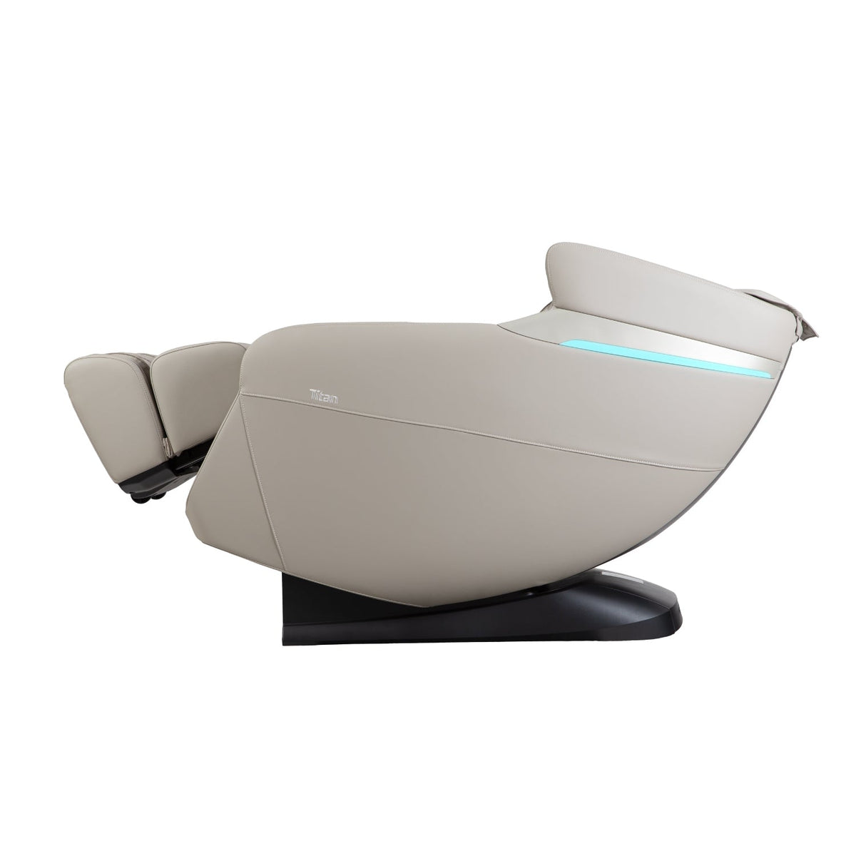 Taupe Titan Forma 3D+2D reclined in the zero gravity position with the leg rest raised