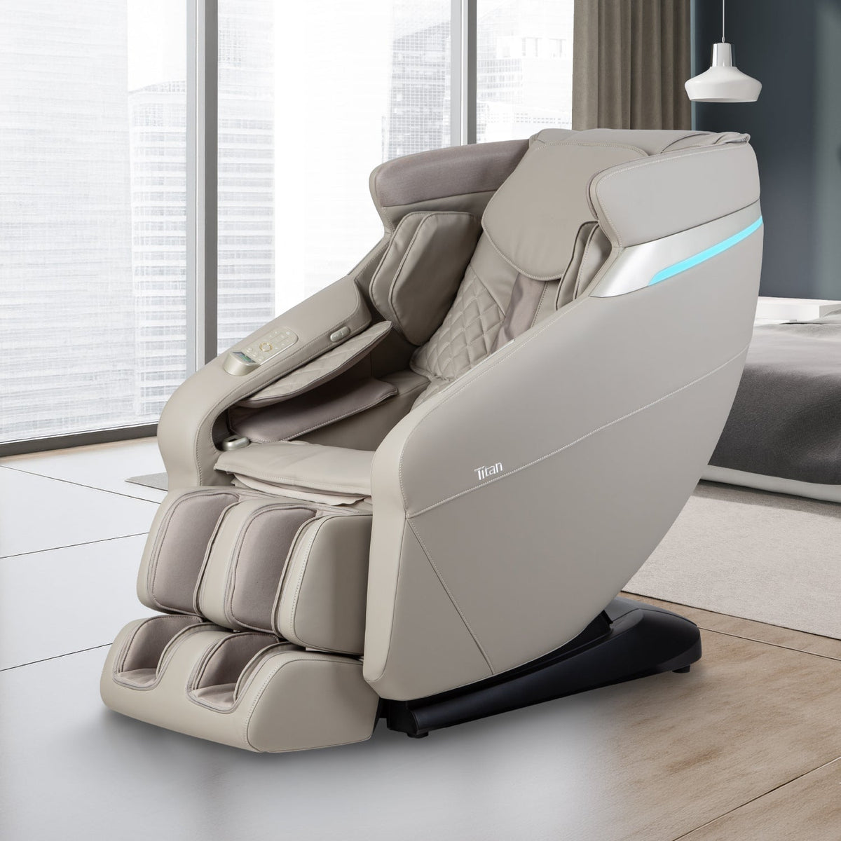 Taupe Titan Forma 3D+2D massage chair in a light, modern room with tall windows