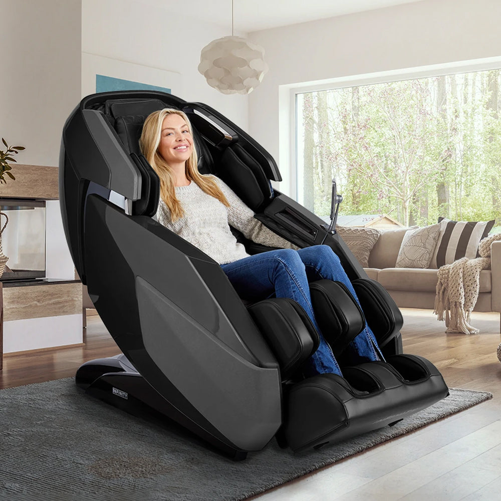 Infinity Imperial Syner-D Massage Chair Black Staged With Model Angled View