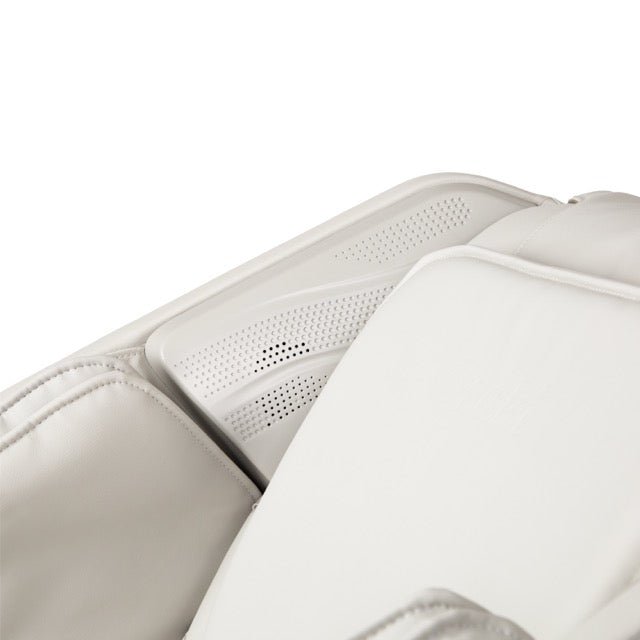 Close-up of the Osaki Nova II 3D+ headrest cushion and perforated Bluetooth speaker grille